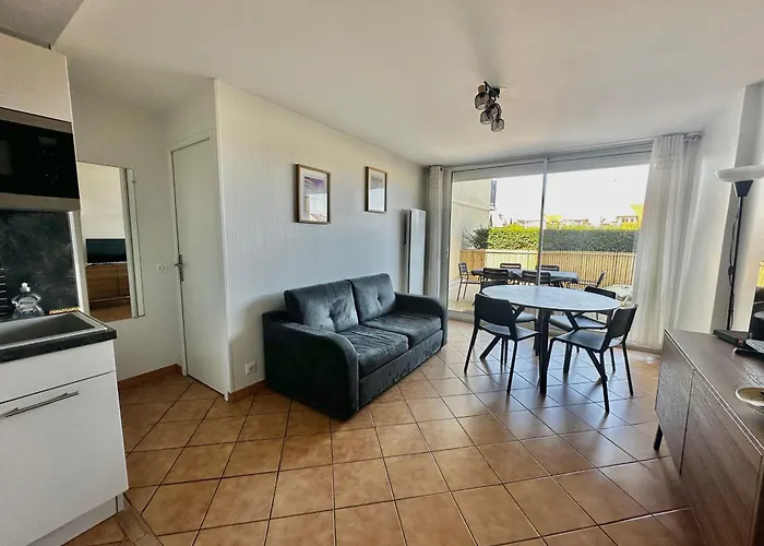 Loubapa, En Rez-de-jardin Appartement *